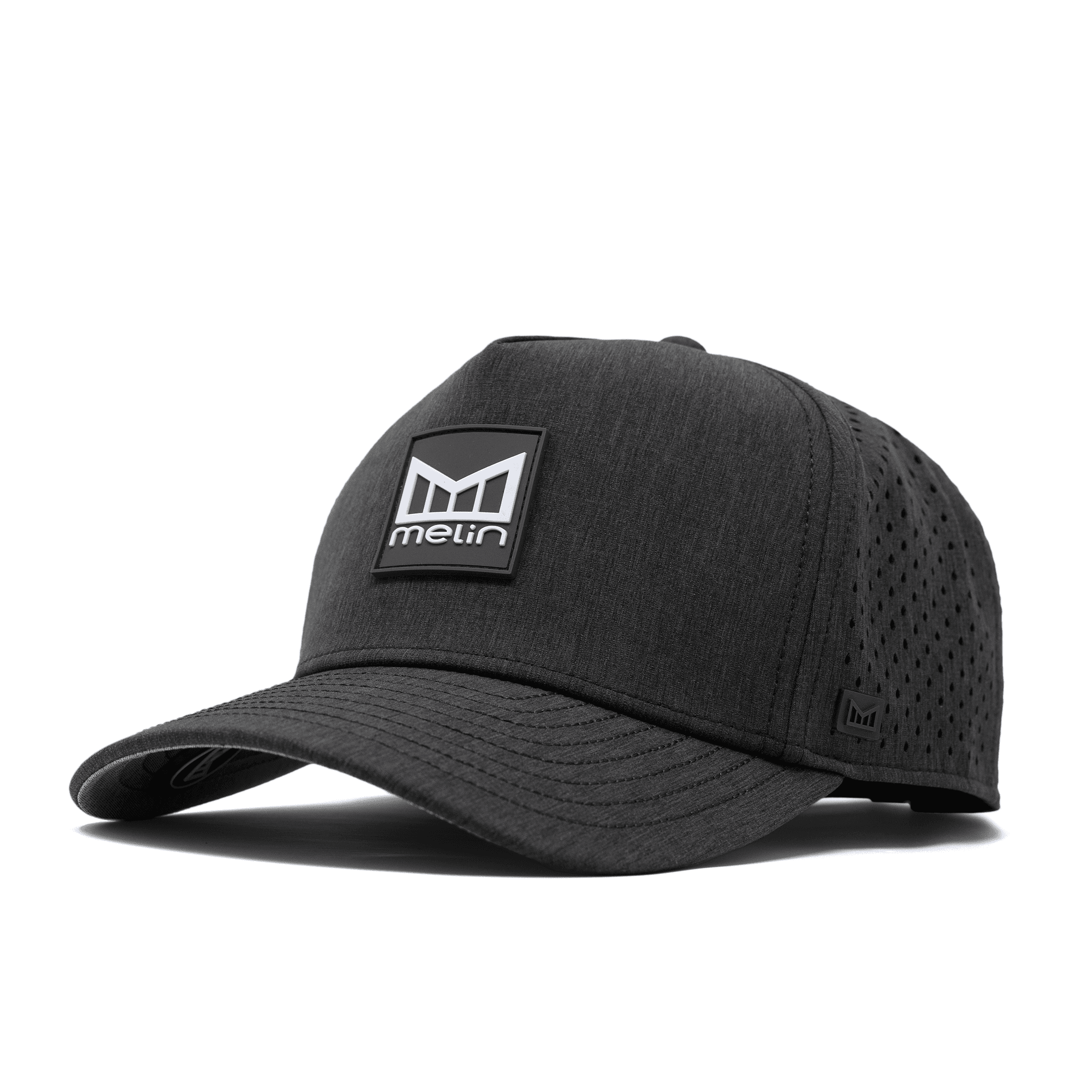 Melin Odysea Stacked HYDRO hat in Heather Charcoal, three-quarter angled view showing the Melin logo patch
